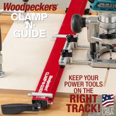 Clamp-N-Guide clamped to plywood and guiding circular saw.