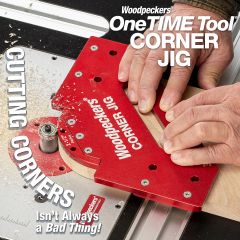 Woodpeckers Corner Jig in use on router table cutting 2-1/2" radius corner.