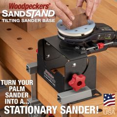 Sanding a small block of wood on sander secured in SandStand.