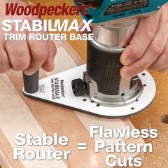 Cutting cherry charcuterie board with cordless trim router with StabilMax base attached.